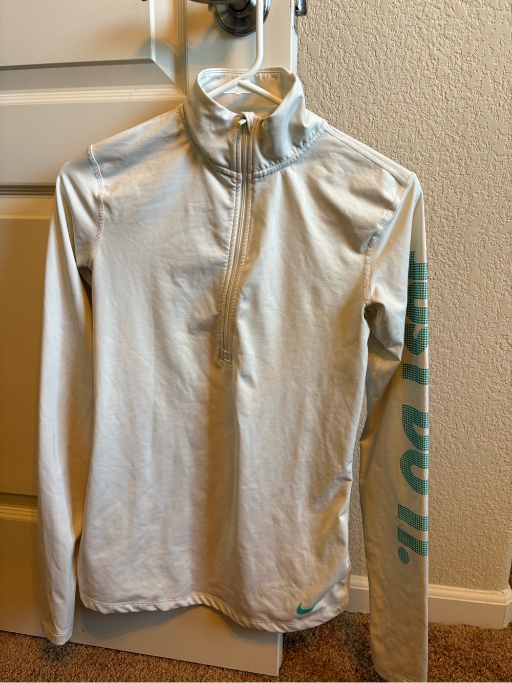 NWOT Nike White Quarter-Zip Pullover with Teal Accents